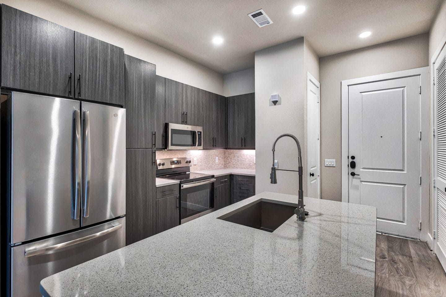 Gourmet Kitchens with Stainless Steel Appliances at Windsor Burnet, 10301 Burnet Rd, TX