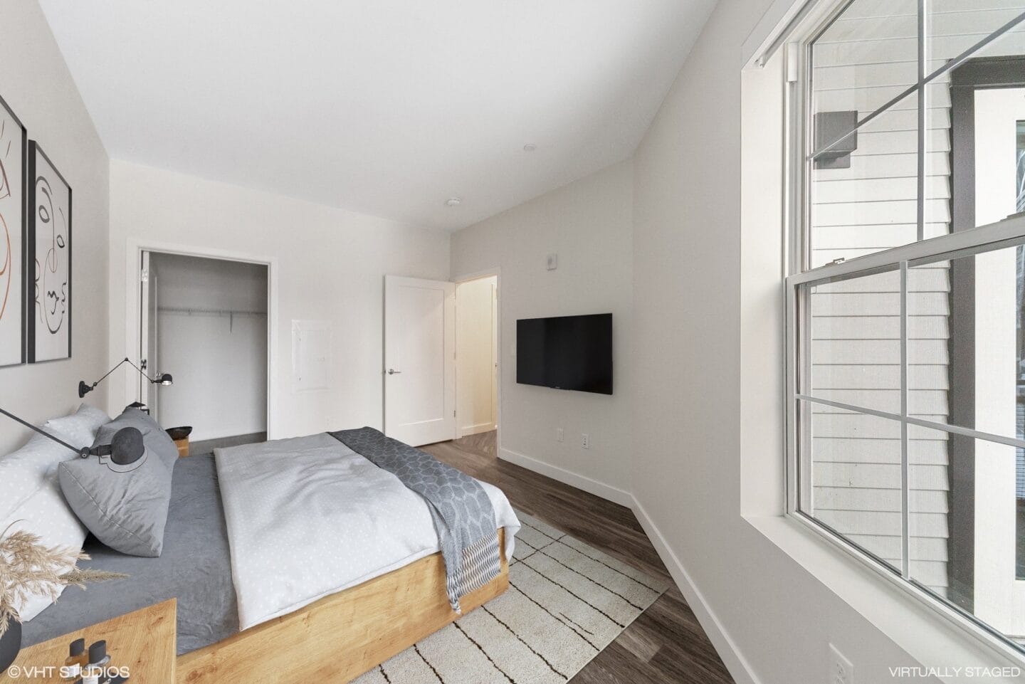 Bedroom with spacious closet at Edison in the Charles by Windsor, Massachusetts.