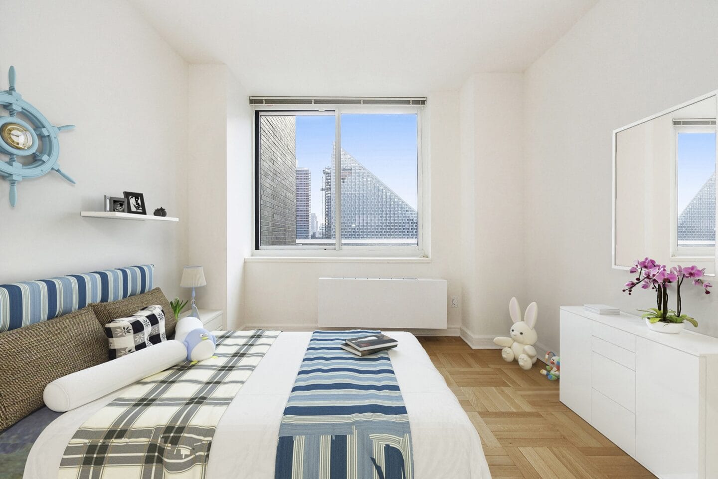 Bedroom with city view at The Ashley Apartments, New York, New York