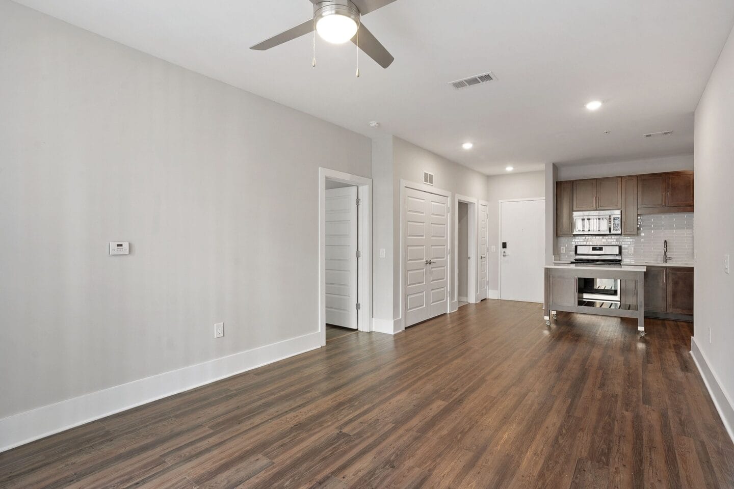 Open concept living, dining and kitchen spaces  at Windsor Morningside, Atlanta, GA