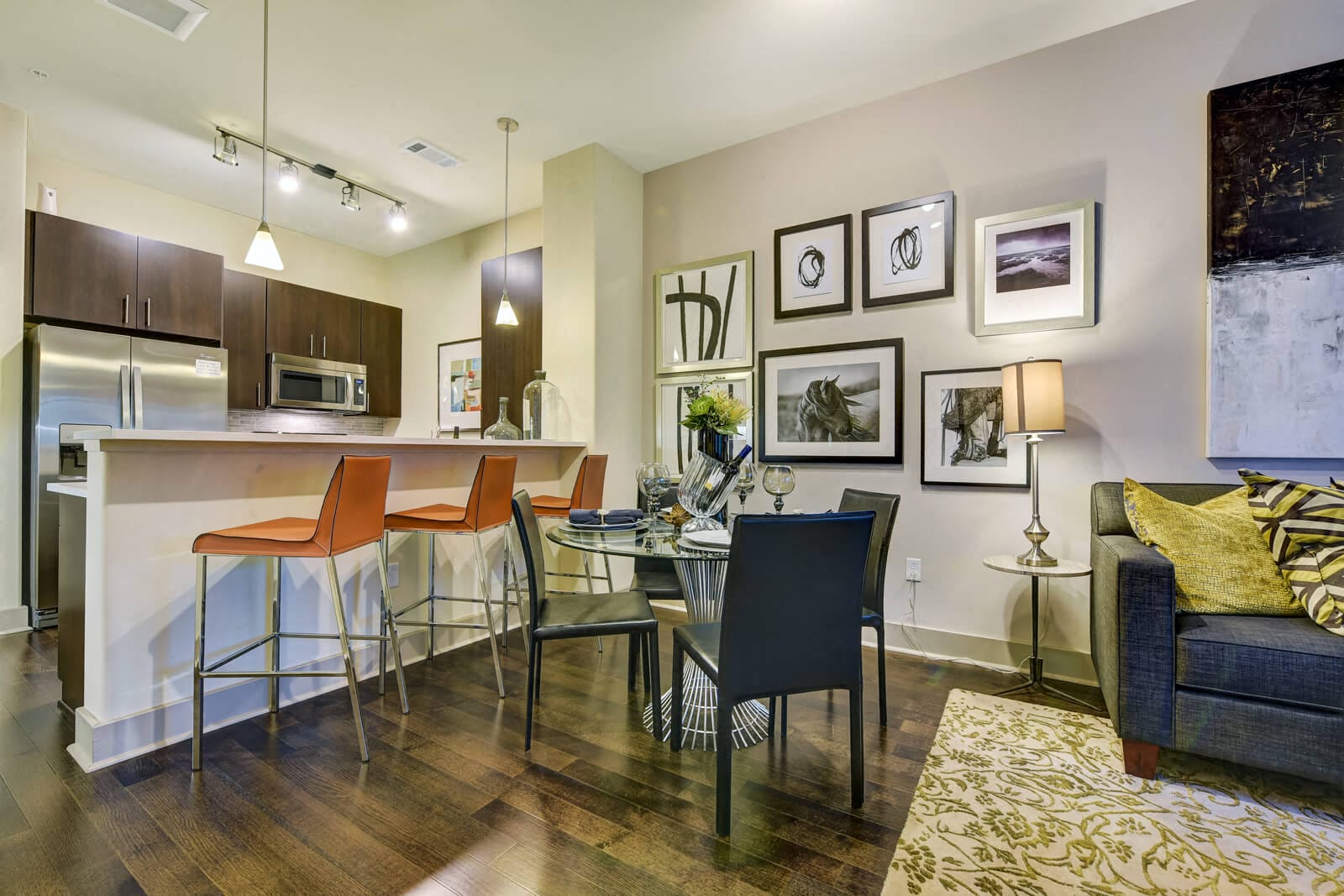 Open Flow Living Rooms with Wood Flooring at Windsor at Cambridge Park, Cambridge, Massachusetts