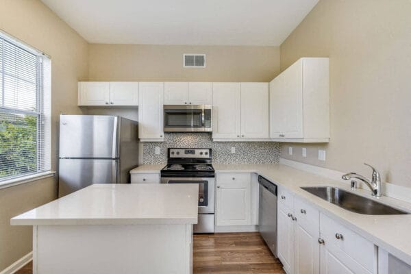 Open-Concept Kitchens with Quartz Countertops and Stainless Steel Appliances at The Estates at Park Place, Fremont, California