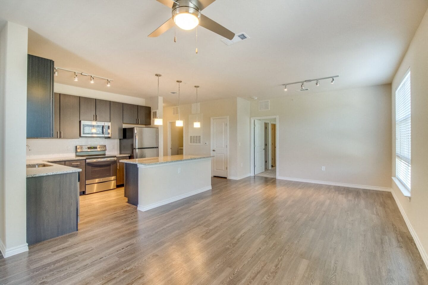 Chef-Inspired Kitchen Islands with Chic Pendant Lighting at Windsor Republic Place, 5708 W Parmer Lane, Austin