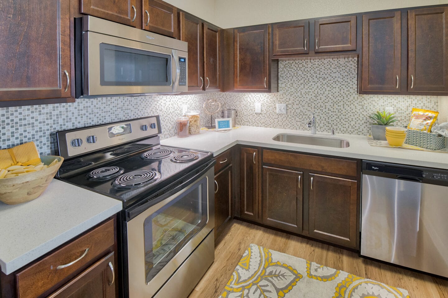 Designer Kitchen with Granite Counters and Stainless Steel Appliances at Windsor at Aviara, 92011, California