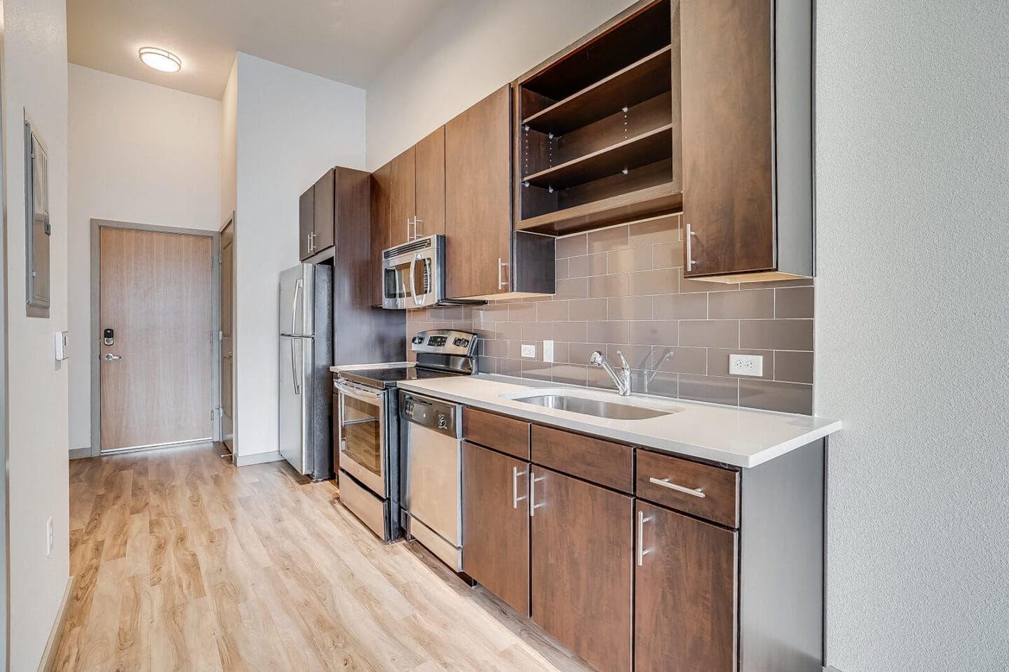 Stainless Steel Appliances and Backsplashes in Kitchen at The Casey, Denver, Colorado