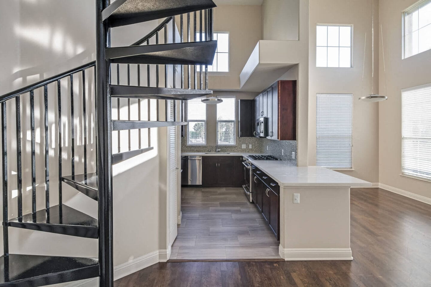 Spiral Staircases in Select Apartments at Windsor at Hancock Park, Los Angeles, CA