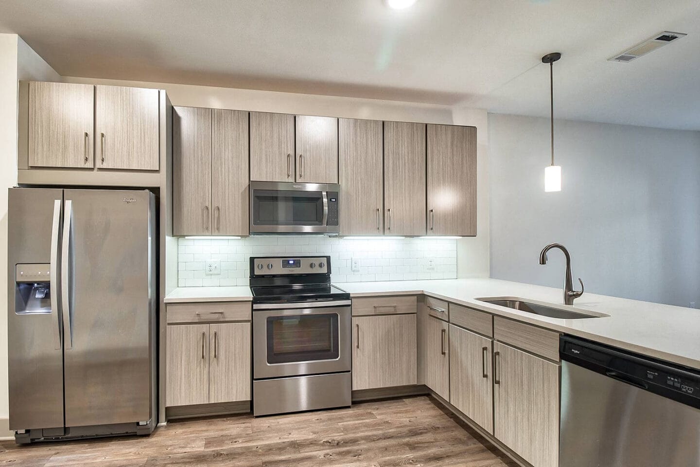 Stainless Steel Appliances and Tile Backsplash in Kitchens at Windsor Parkview, 5070 Peachtree Boulevard, GA