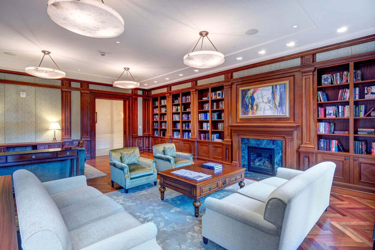 Club Room With Large Screen Tvs And A Fireplace at The Woodley, 2700 Woodley Road, NW, Washington, DC