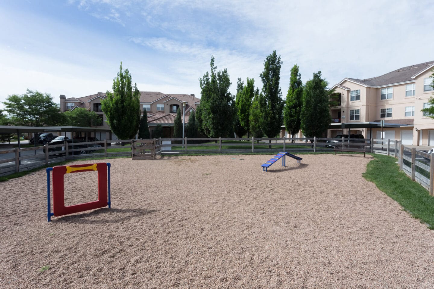 Dog Park with Sand, Grass, and Obstacles at Windsor Meridian, Englewood, Colorado