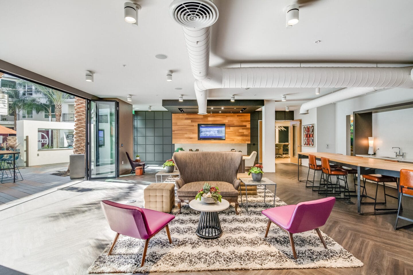 Relaxing Open-Air Lounge Area at Malden Station by Windsor, 250 W Santa Fe Ave, California