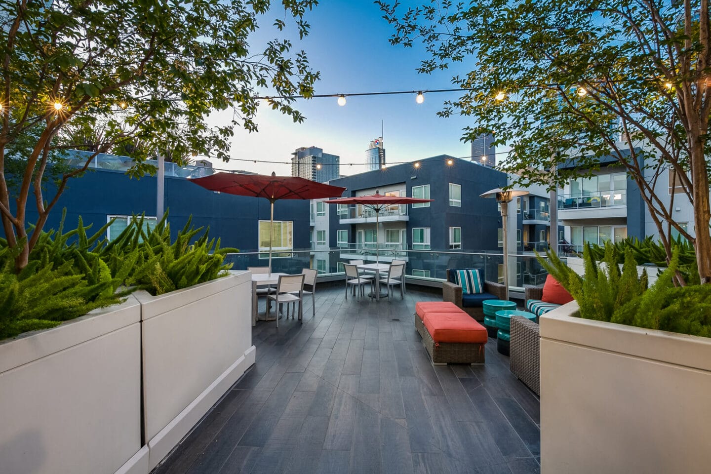 Rooftop Deck with Lounge and Dining Area at Windsor at West University, Houston, Texas