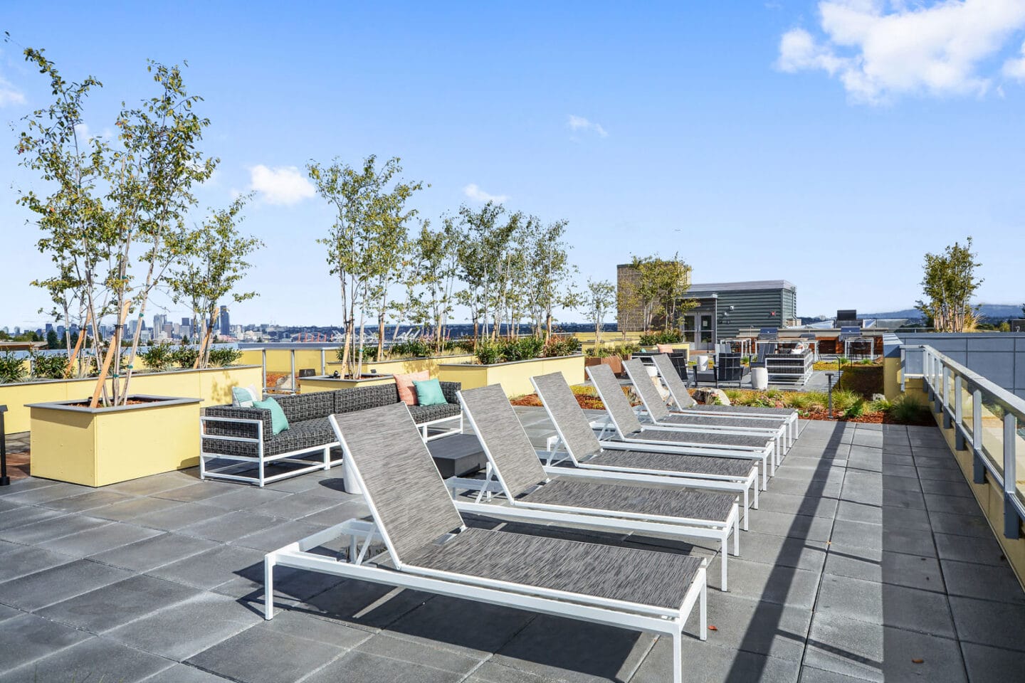 Rooftop Sundeck with Lounge Chairs at The Whittaker, 4755 Fauntleroy Way, Seattle