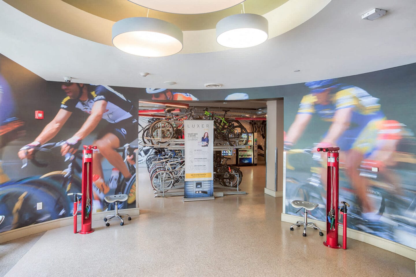 Bike Lounge Equipped with Repair stations, Seating and TVs at Windsor at Cambridge Park, Cambridge, 02140