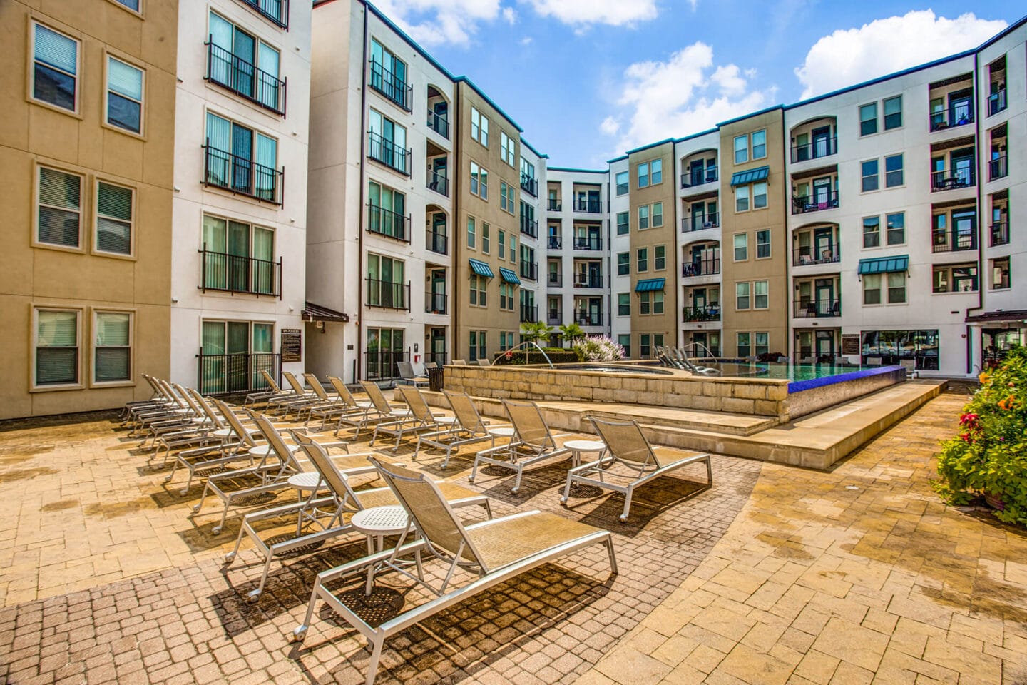 Sundeck around pool at The Monterey by Windsor, Texas, 75240