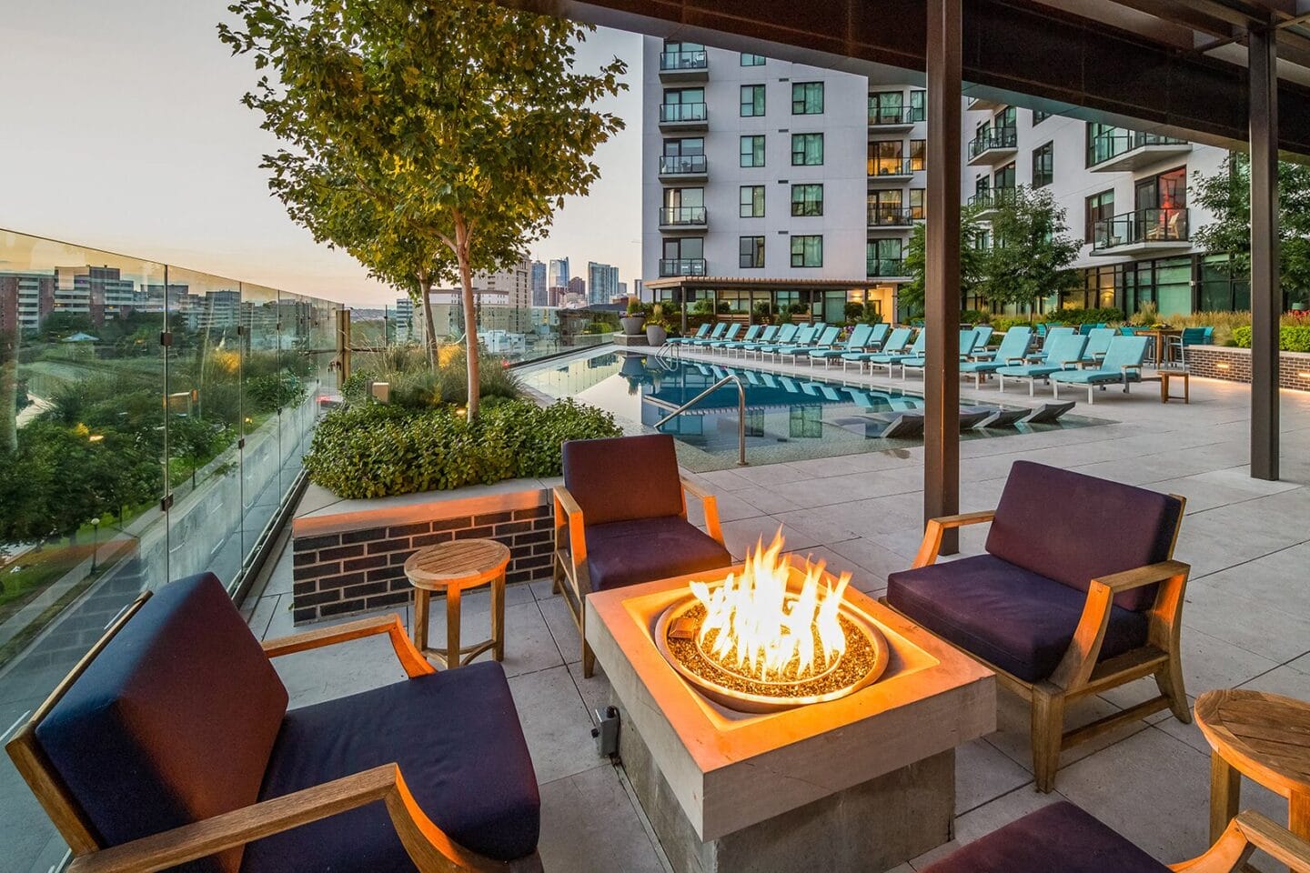 Poolside Entertainment Area With Firepit at 1000 Speer by Windsor, Denver, Colorado