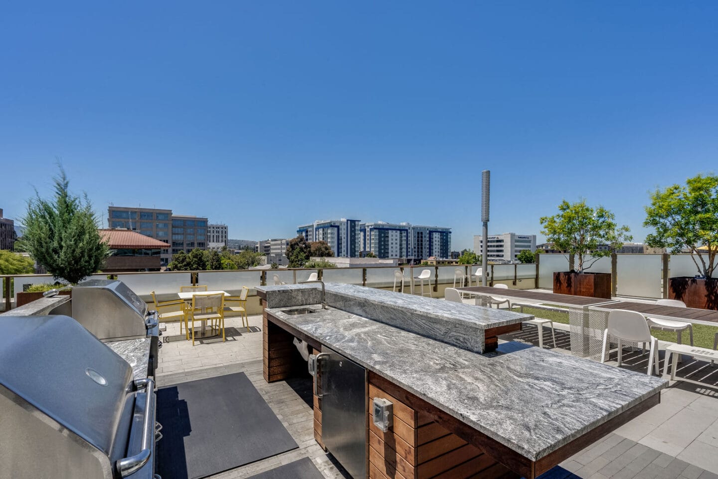 Outdoor space with BBQ Grill at The Marston by Windsor, 94063, CA