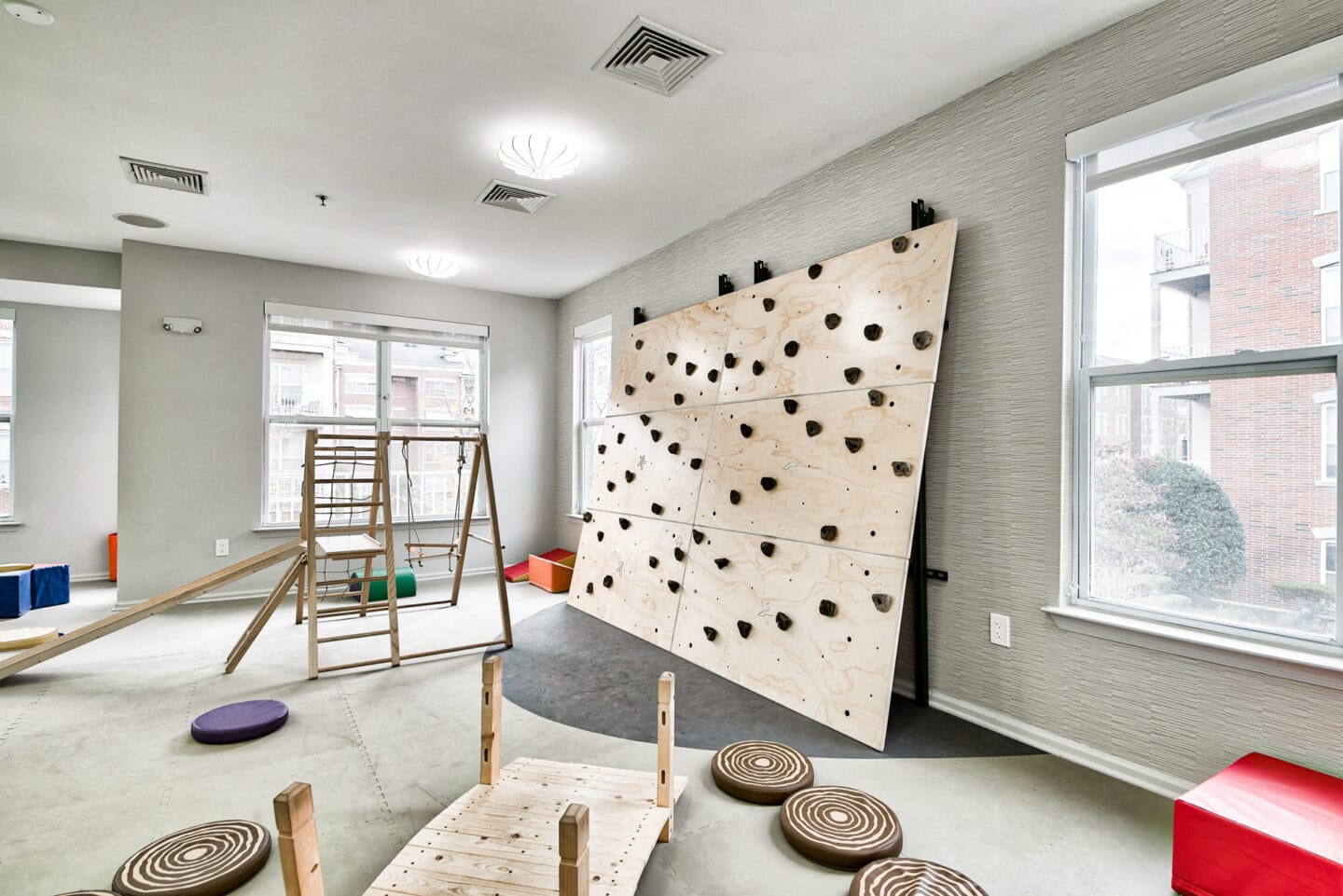 Children's playroom rock wall climbing at Liberty House by Windsor in Jersey City, NJ