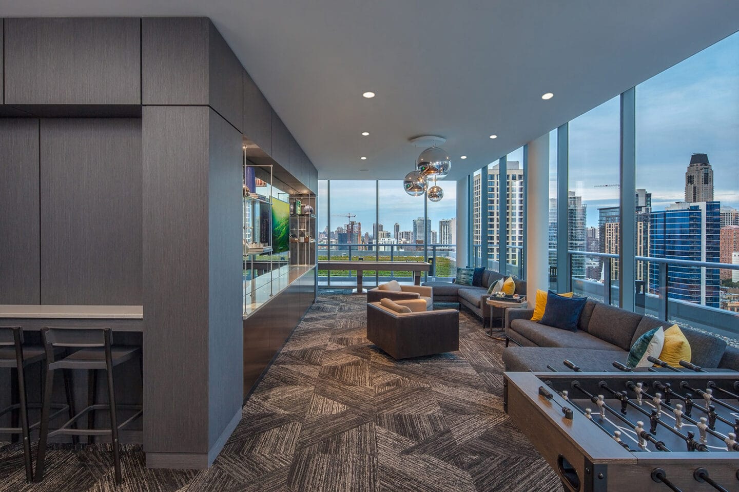 Game Room with shuffleboard, billiards, foosball, giant scrabble and TV at 640 North Wells, Chicago, Illinois