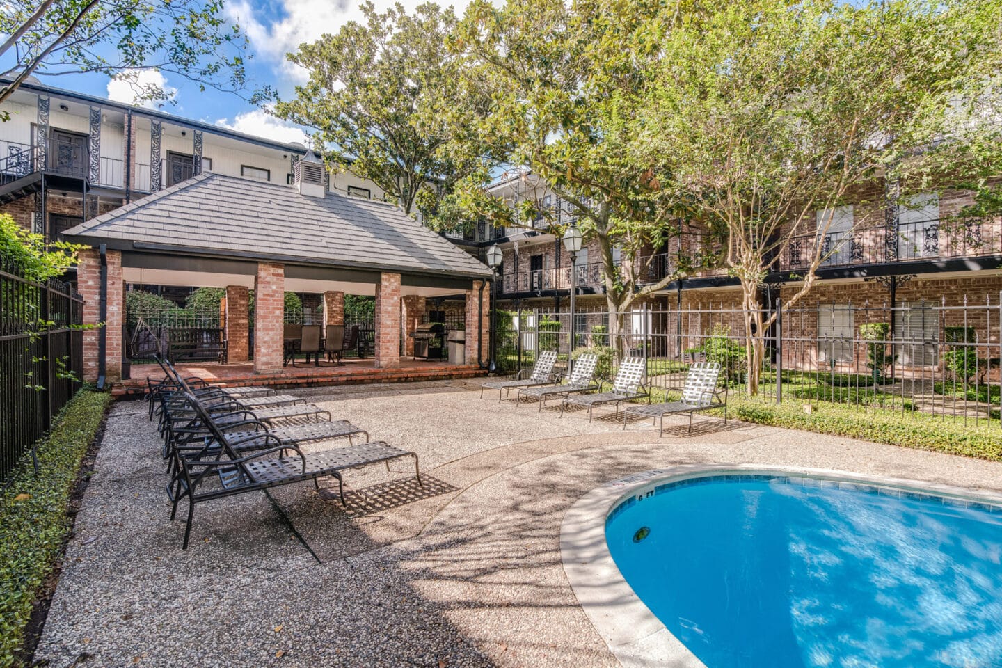 Barbecue Area and Sundeck by Pool at Allen House Apartments, Houston, TX