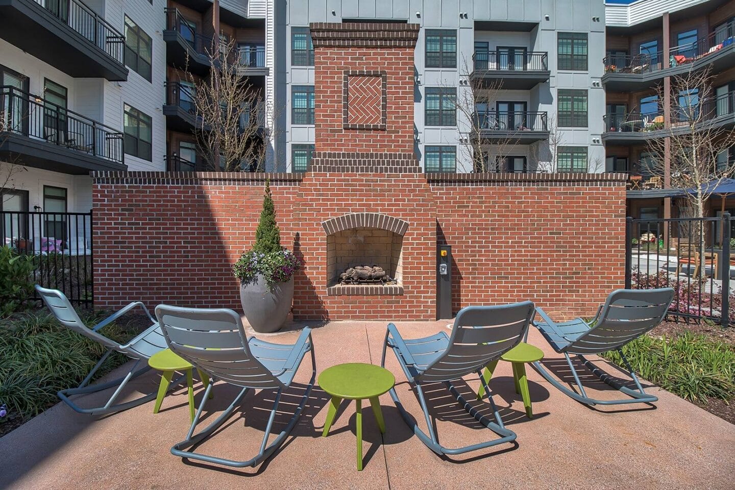 Poolside Fireplace with Lounge Chairs at Windsor Parkview, 5070 Peachtree Boulevard, Chamblee