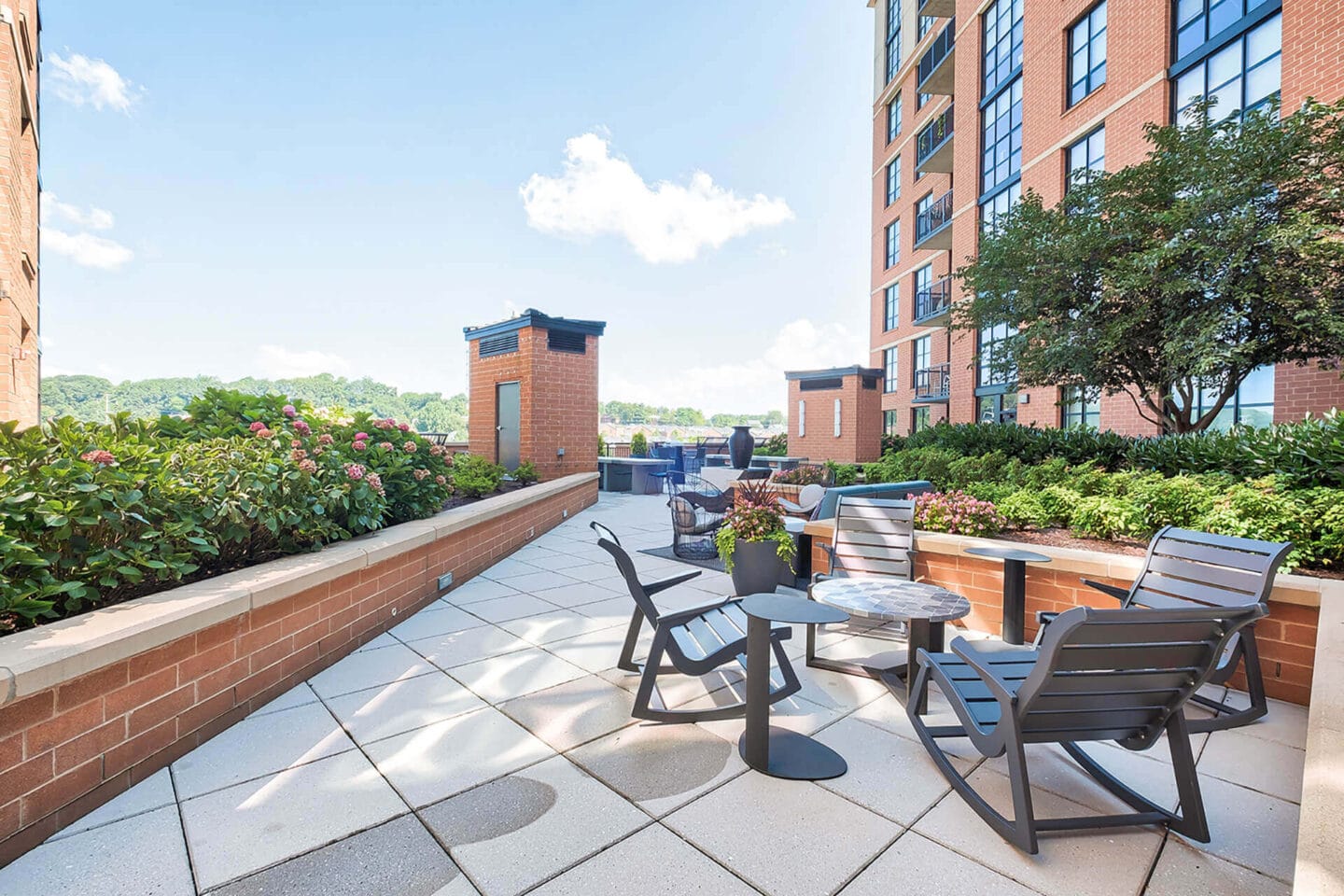 Outdoor, landscaped terrace at IO Piazza by Windsor, Arlington, Virginia