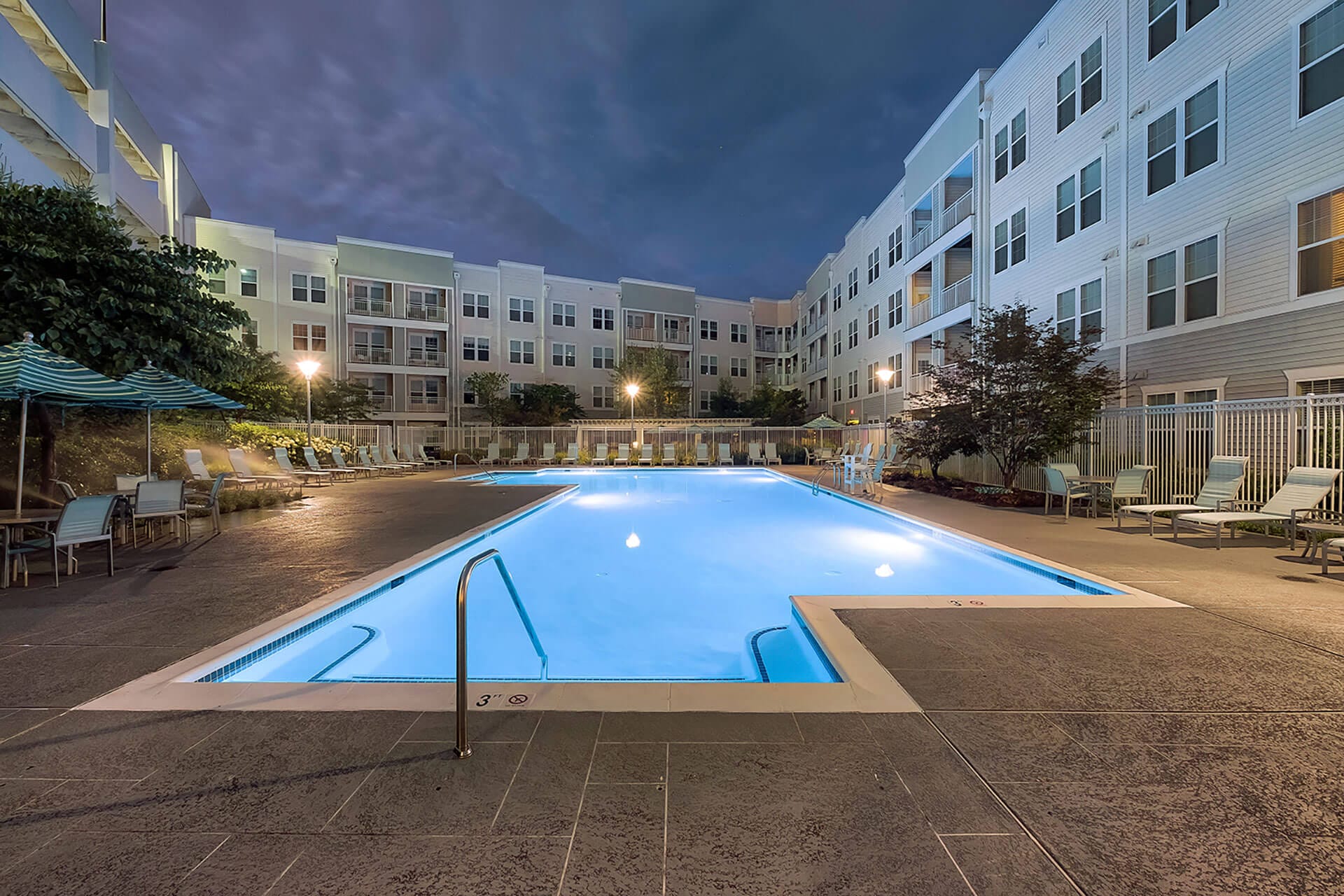 Lighted Pool at Night at The Ridgewood by Windsor, Fairfax, Virginia