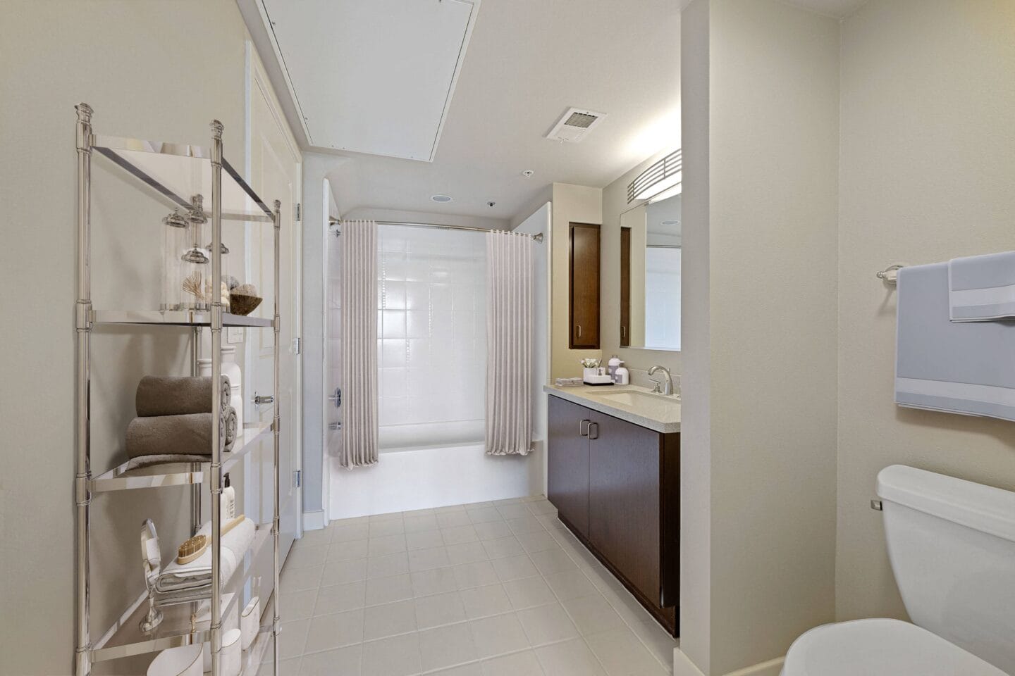 a bathroom with a toilet sink and shower