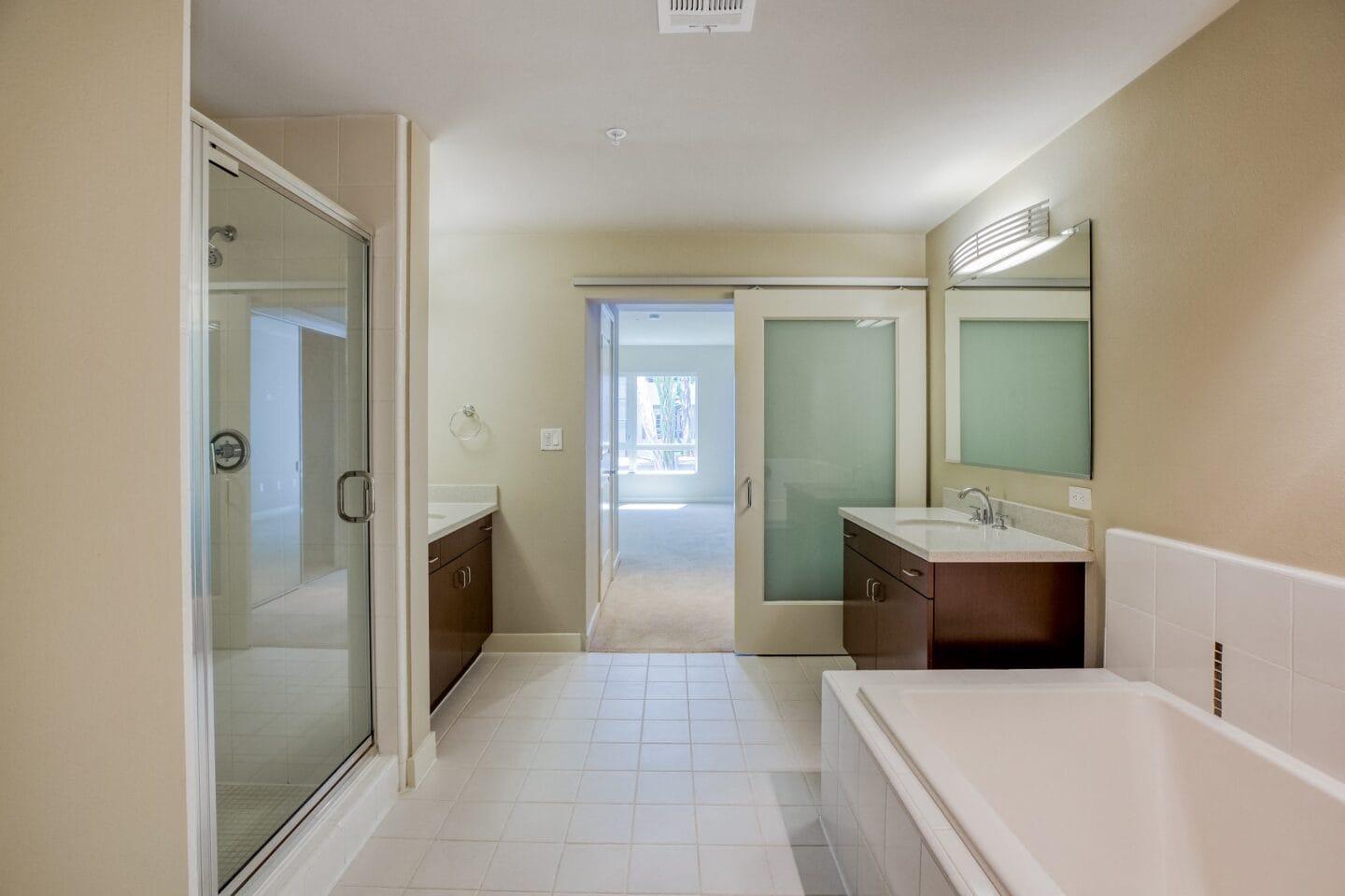 a bathroom with a tub and a sink