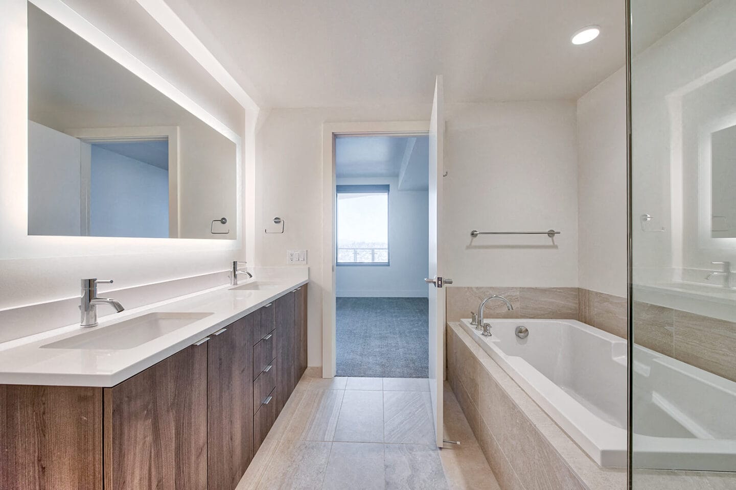 Spa-Inspired Bathroom With Shower And Soaking Tub at Stratus, Seattle