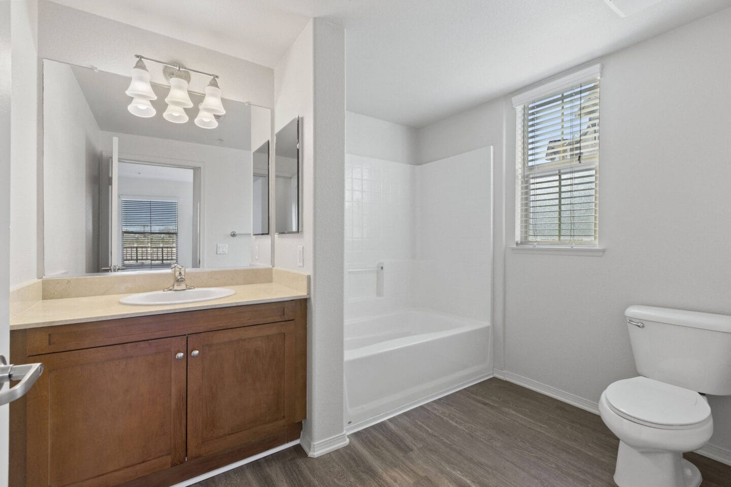 a bathroom with a toilet sink and bathtub