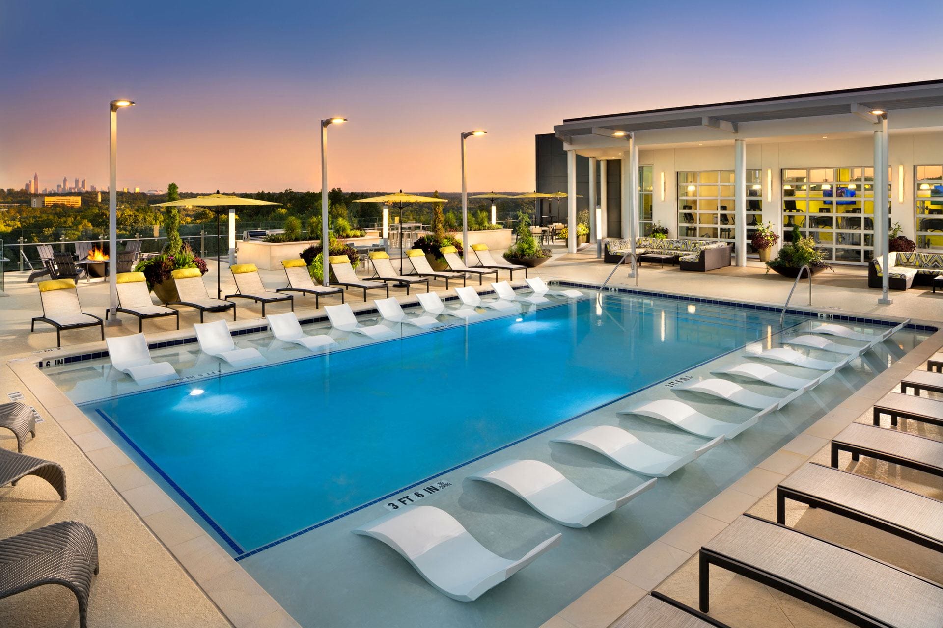 Swimming Pool with Lounge Seating at The Encore by Windsor, Georgia