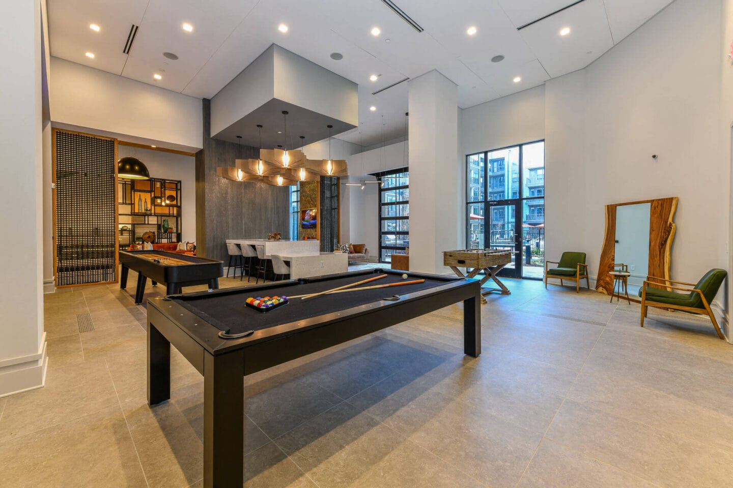 Game tables at Elevate West Village, 4520 Pine Street, GA