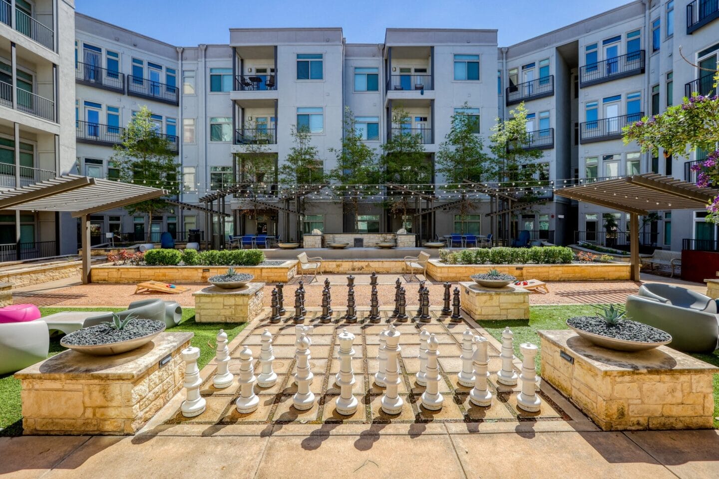 Life Size Chess Courtyard at Eleven by Windsor 811 East 11th Street Austin, TX 78702