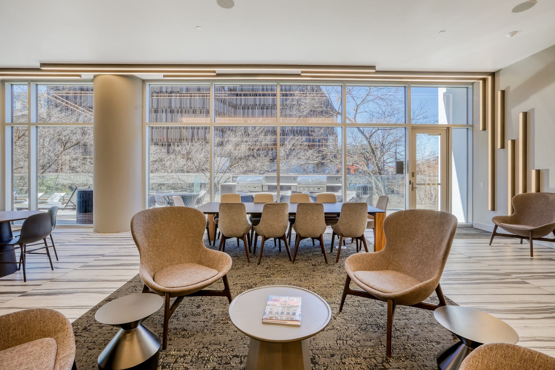 a room filled with furniture and a large window