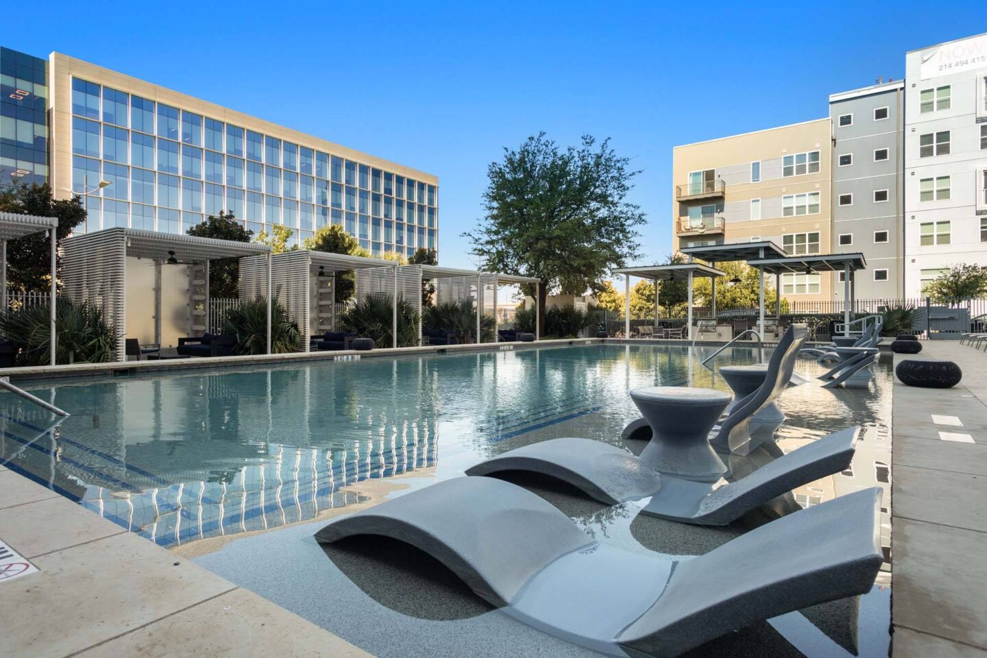 A modern pool area at Metro West, Texas, 75024.