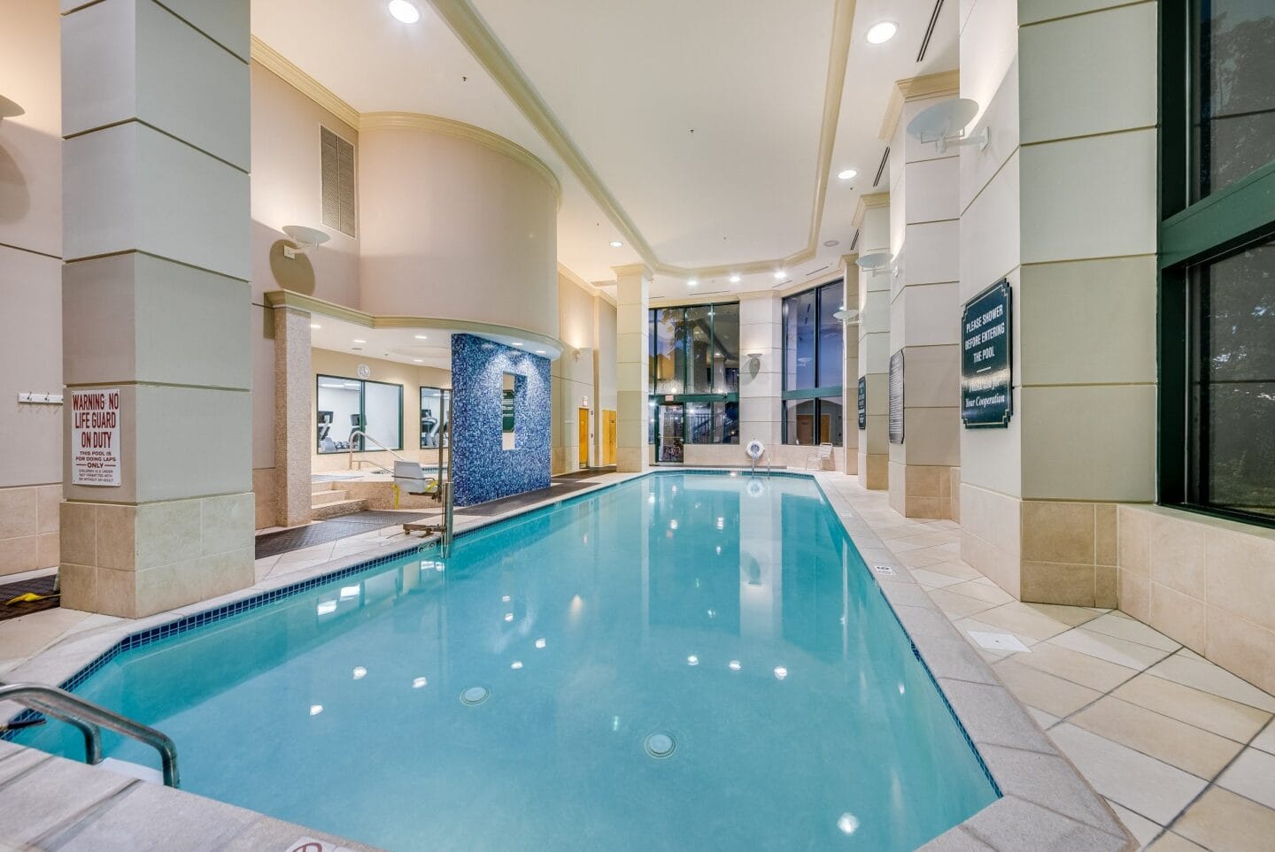 a swimming pool in the lobby of a hotel