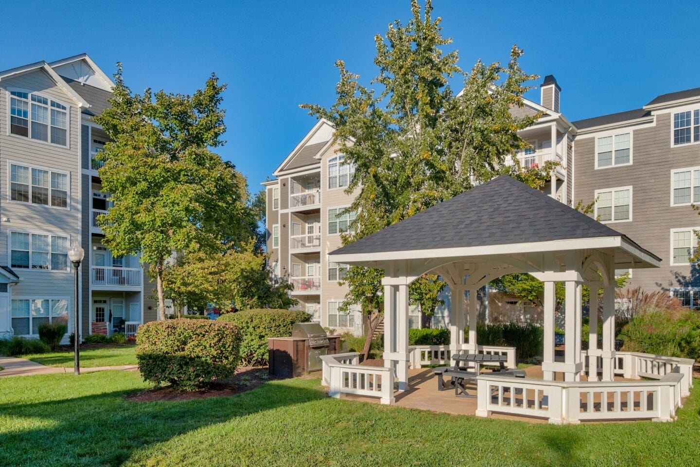 Outdoor pergola with grilling station at Windsor Herndon, Herndon, VA