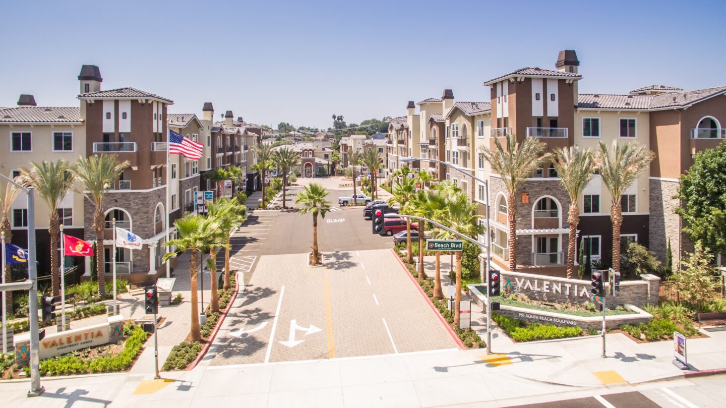 A street view of a residential area with the name 