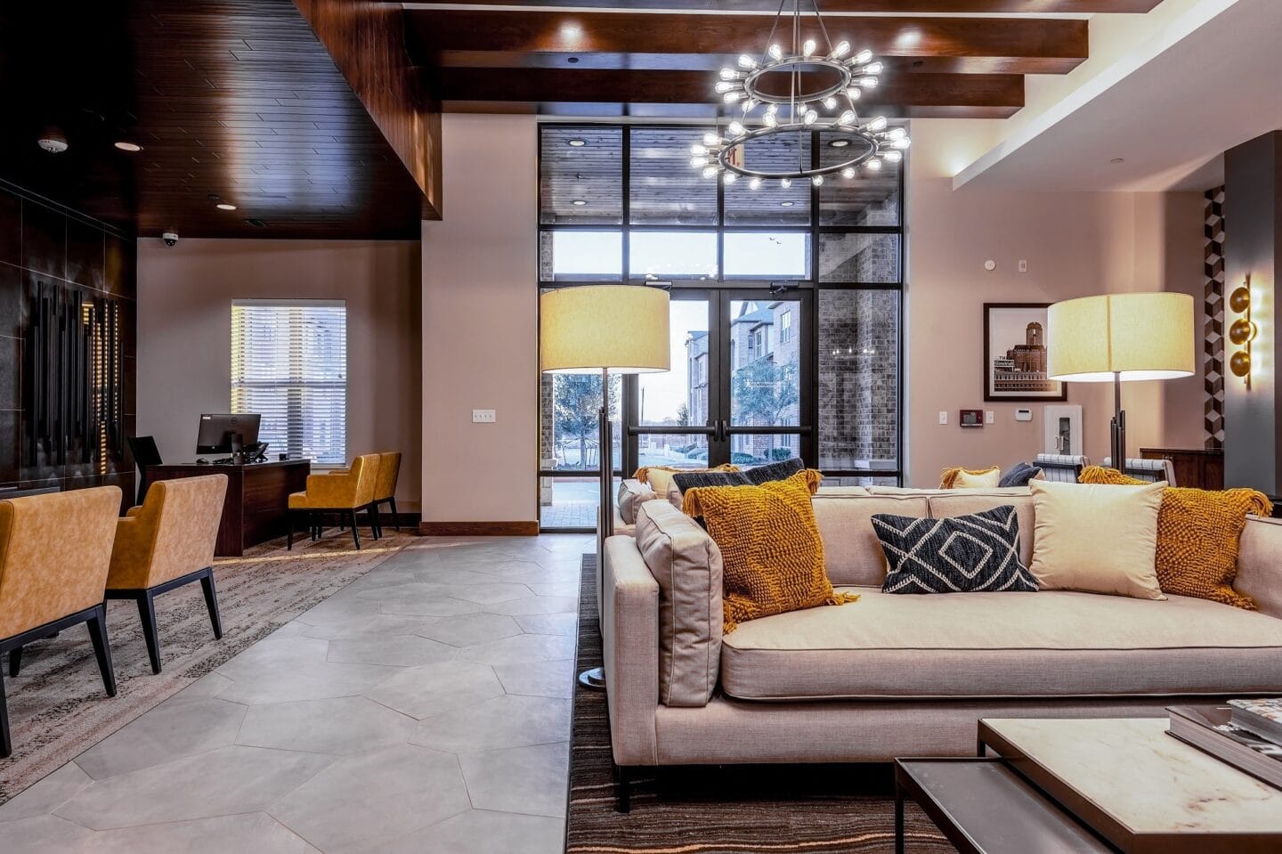 Leasing Office and Clubhouse with White Armchairs on Area Rug with Coffee Tables at Windsor Castle Hills, Carrollton, 75010