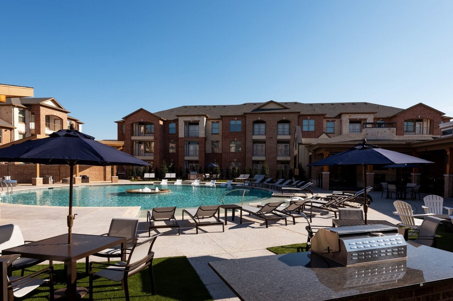 Relaxing Pool Area With Sundeck at Windsor Castle Hills, Carrollton, TX, 75010