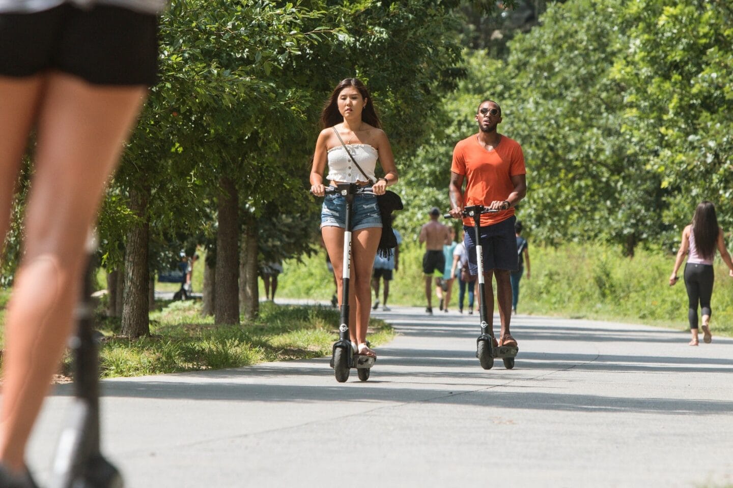 People on scooter at Elevate West Village, GA, 30080