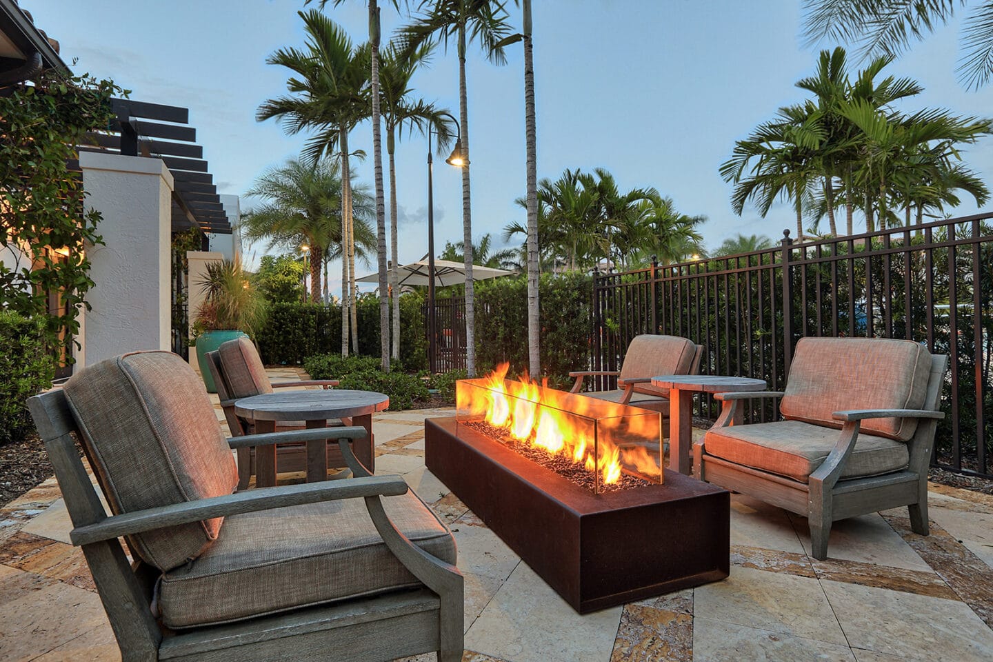 Outdoor lounges allow you to enjoy the Florida weather throughout the year at Windsor at Delray Beach, Florida