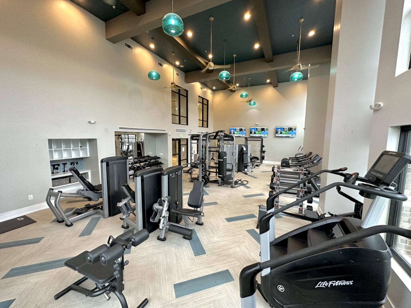 A spacious fitness center with treadmills and elliptical machines at Windsor Old Fourth Ward, Atlanta, GA