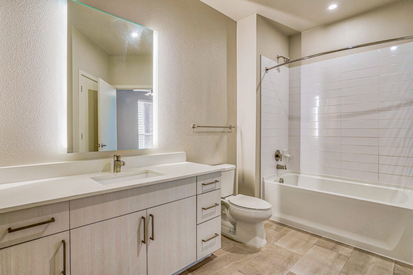 A bathroom with a bathtub and a toilet at Windsor South Congress, Austin, 78745