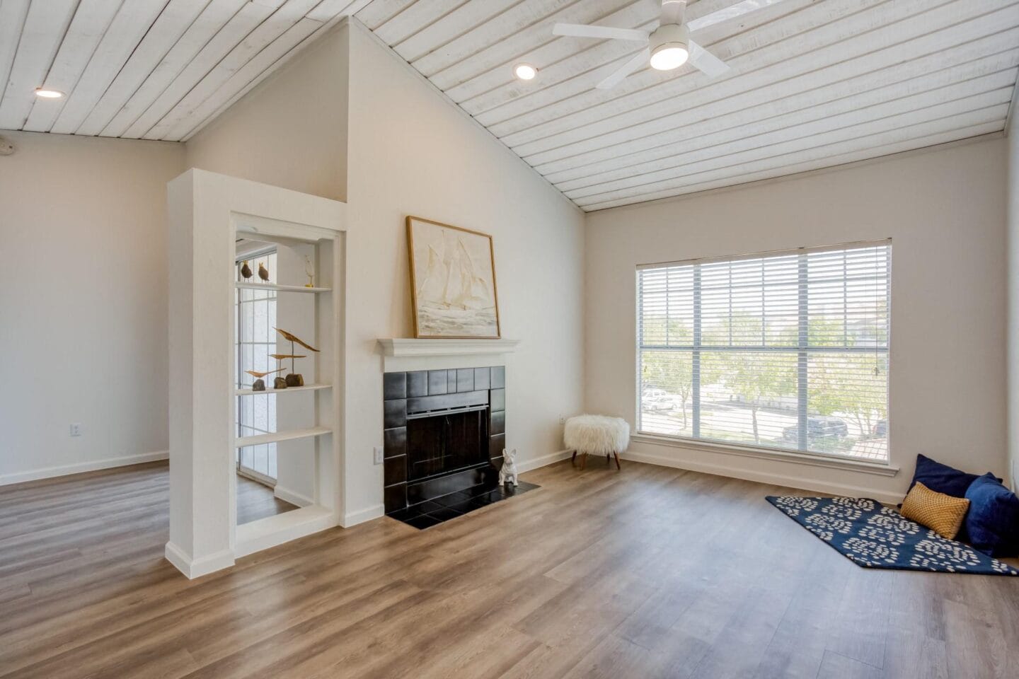 Unique living room layout with large windows