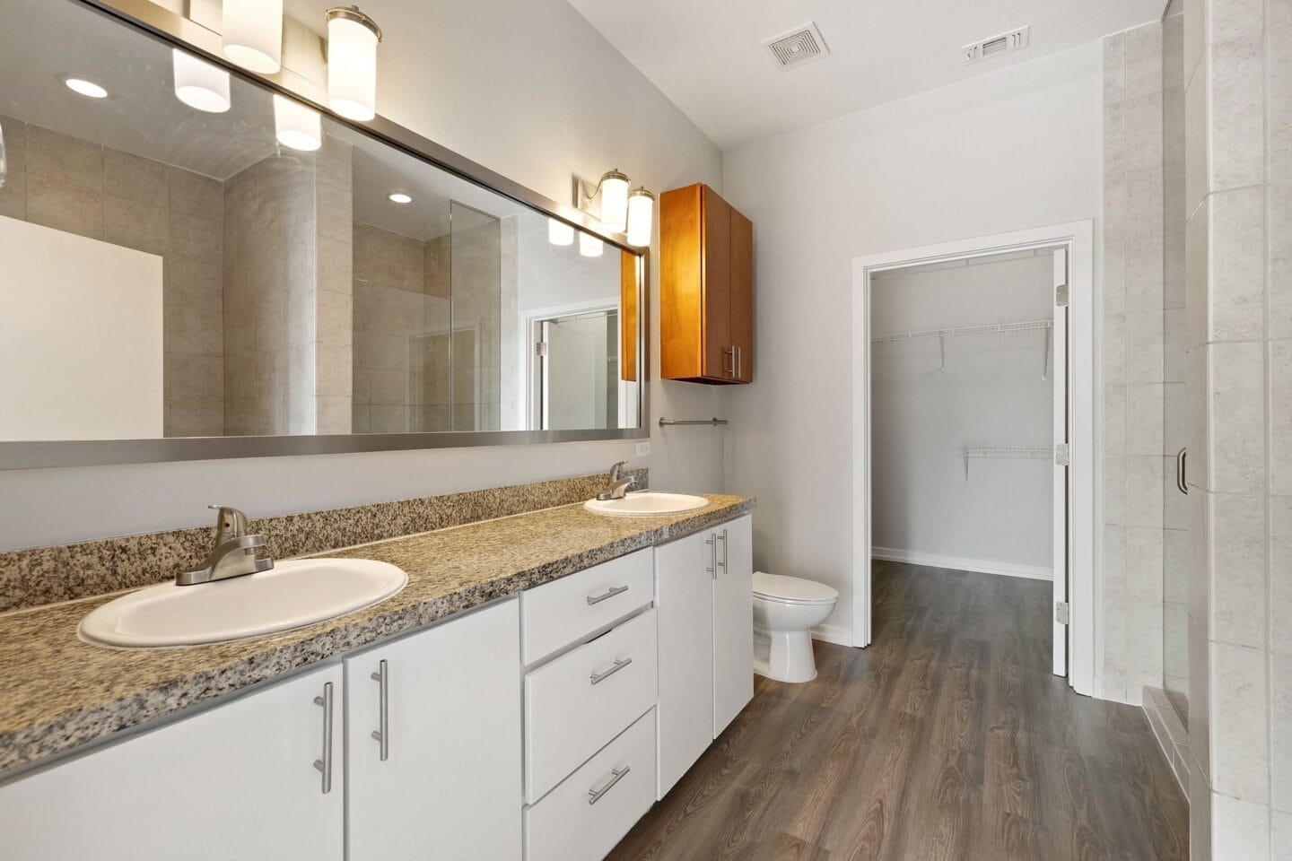 Bathroom with granite counters The Monarch by Windsor, Austin, TX