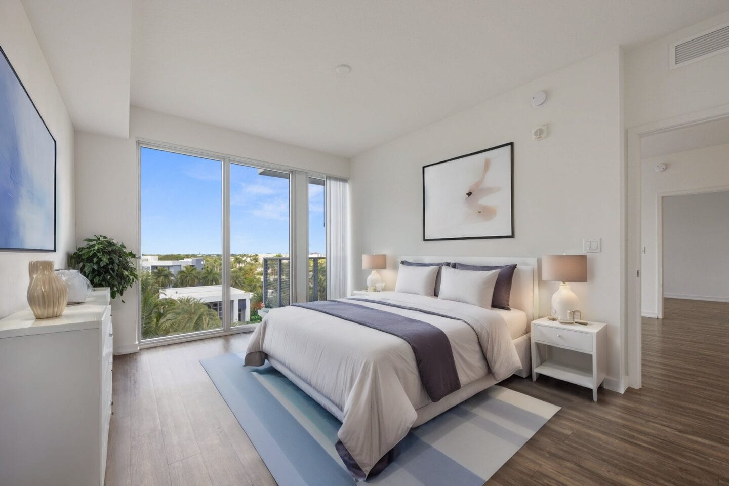 Large bedroom with oversized windows at Allure by Windsor, 33487, FL