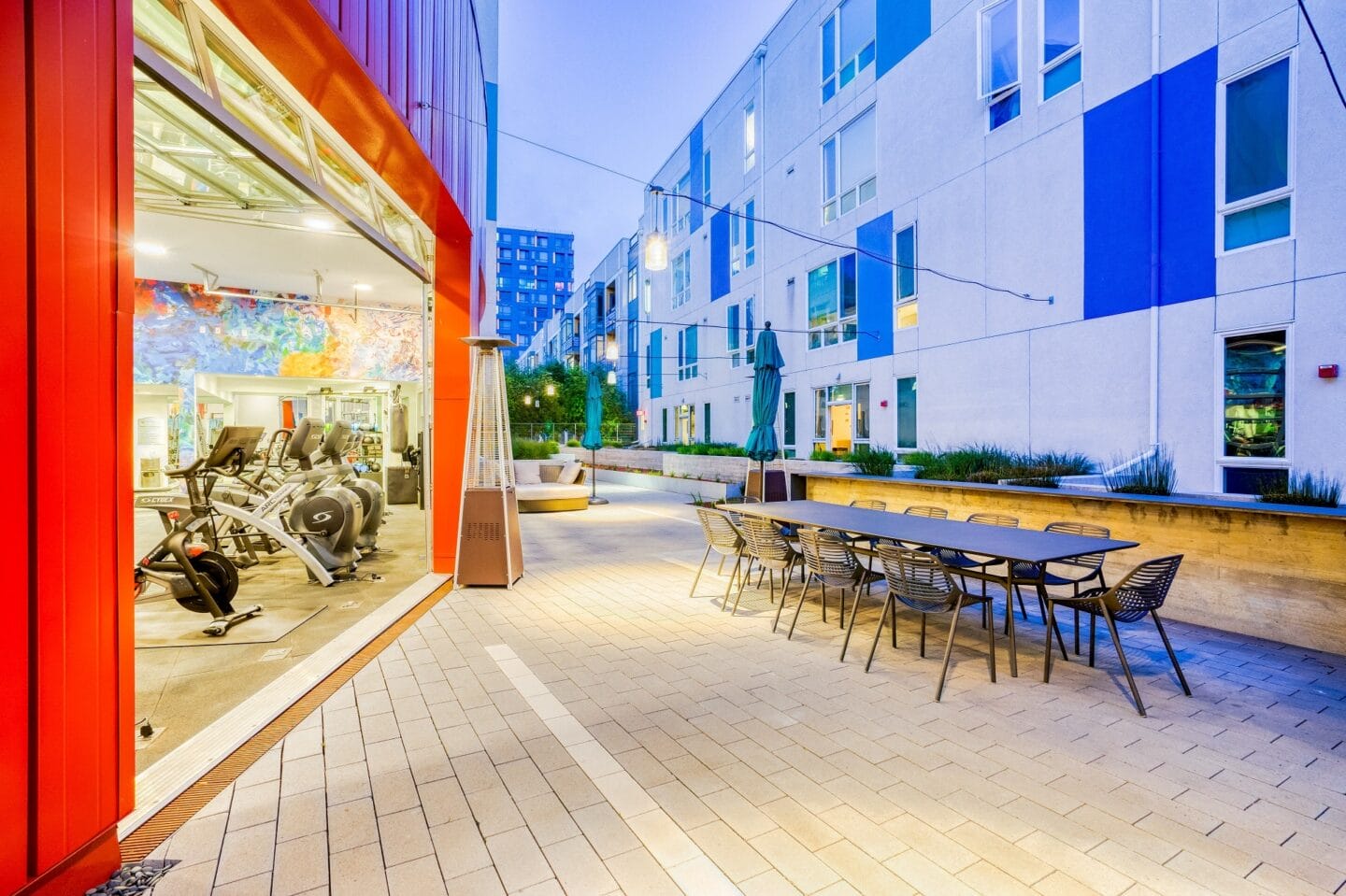 Fitness Center with Retractable Door for Fresh Air Workout at Mission Bay by Windsor, San Francisco, 94158