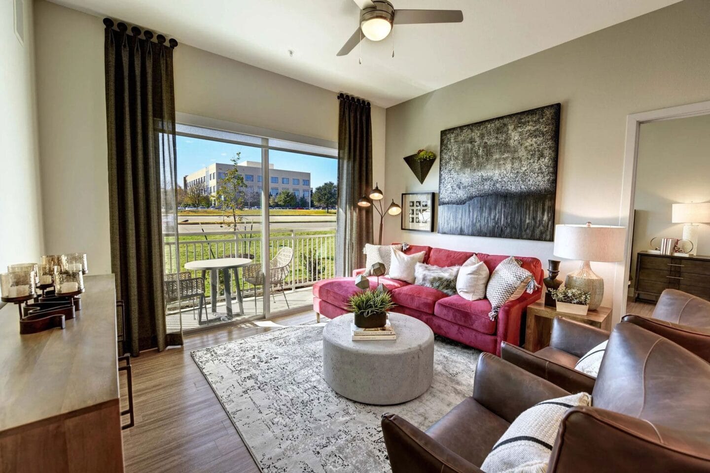 Decorated living room at Windsor Preston, 7950 Preston Road, Plano