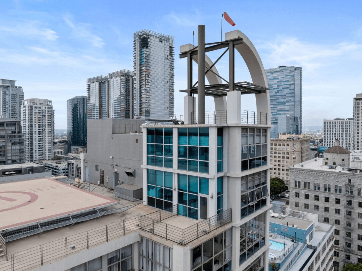 a view of the city from the top of a tall building